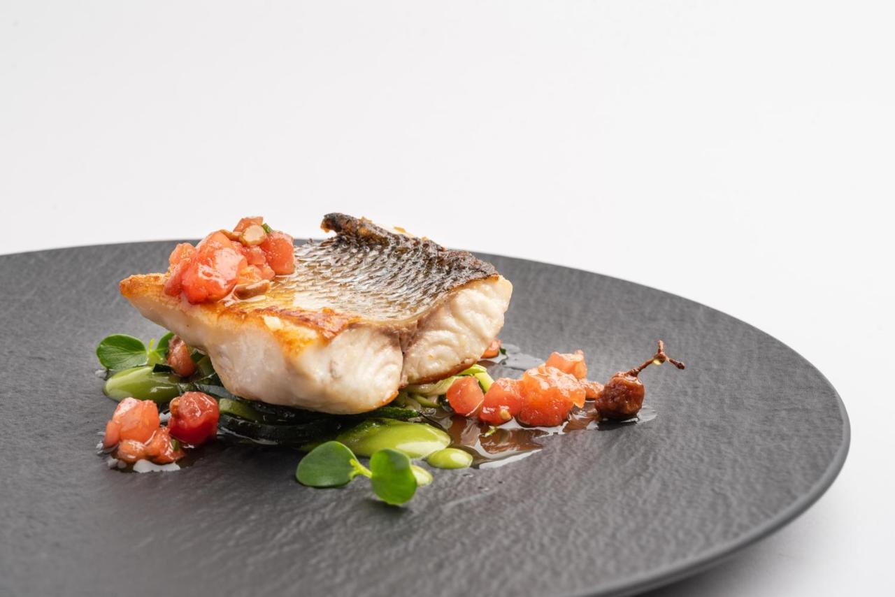 Eurostars Hotel De La Reconquista Οβιέδο Εξωτερικό φωτογραφία A prepared fillet of grouper